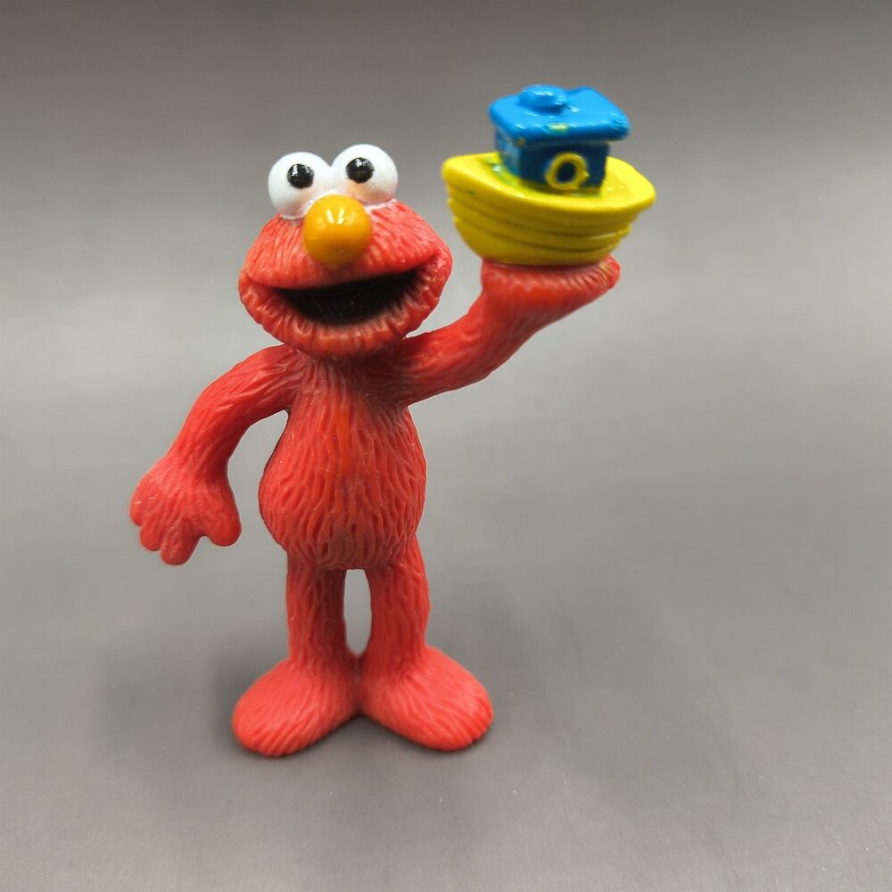 Vintage Tyco PVC Sesame Street Elmo Action Figure Holding Boat Toy 1997 3"